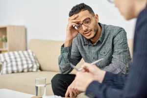 psychologist and patient in therapy session